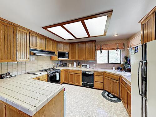 New Listing! Fireside Fun With Deck, Game Room & Bar Home