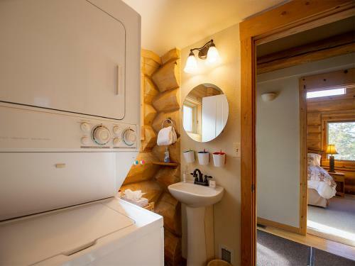 Miles Behind Log Cabin