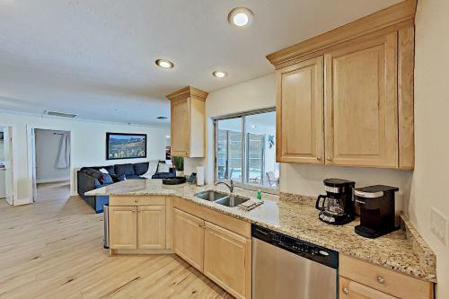 Canal-front Getaway With Heated Pool & Dock Home