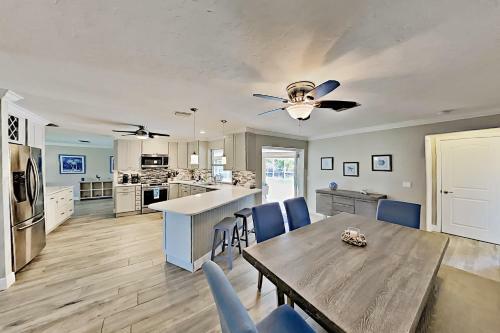Chic Canal-front Home - Heated Pool, Private Dock Home