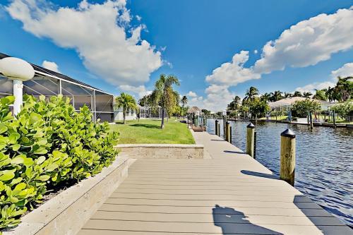Chic Canal-front Home - Heated Pool, Private Dock Home