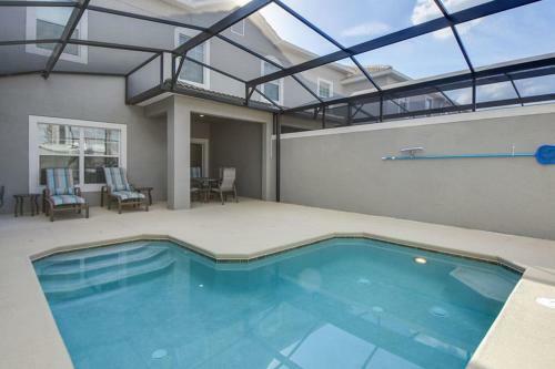 Modern 4 Bed 3 Bath Townhome In Championsgate Golf Resort