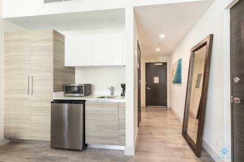 Beachfront Condo Rooftop Infinity Pool Studio