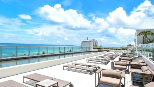 Special Offer Beachfront Condo Rooftop Pool
