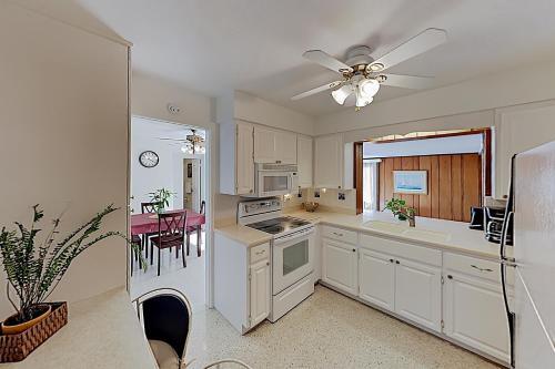 New Listing! Canal-front Escape With Private Yard Home