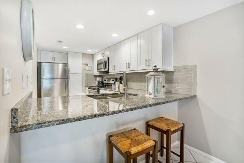 Ocean Views, Heated Pool, Private Patio, Steps To The Beach!