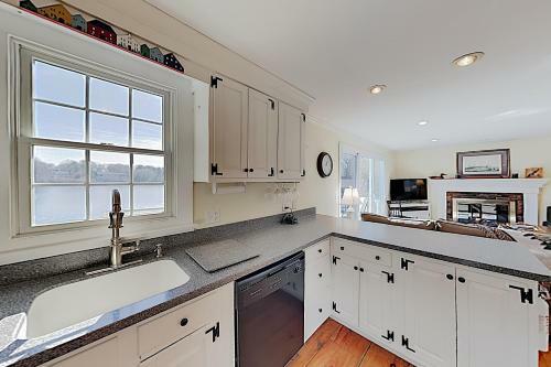 New Listing! Waterfront Gem With Private Deck Home