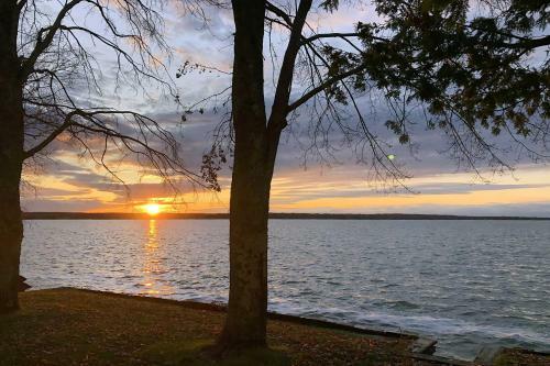 Lakefront Home With Sandy Shores And Sunset Views