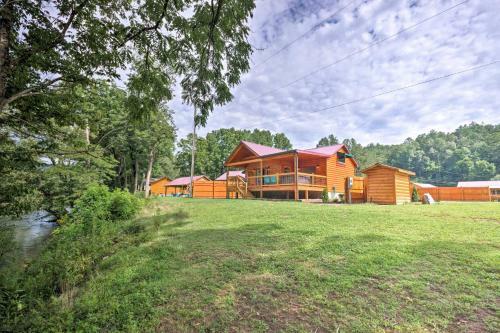 Charming Riverfront Cabin With Private Deck And Hot Tub