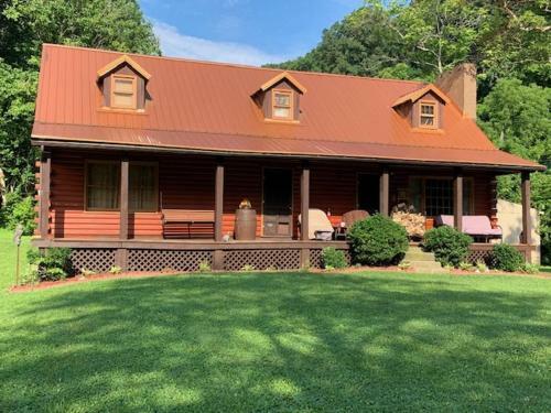 Log Cabin In The Field