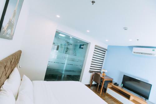 Queenie Hotel - Freyza Hotels