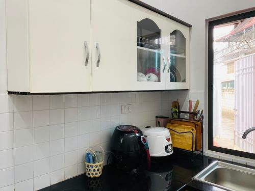 Apartamento Camellia's Home / Nh� Tr�