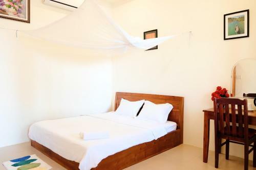 Hostal The Palm Tree Guesthouse