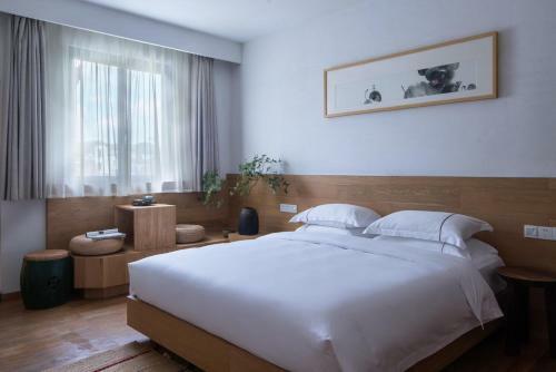 Hostal Huanghsan Su House