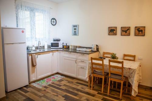Lodge Olive - Israeli Zimmer