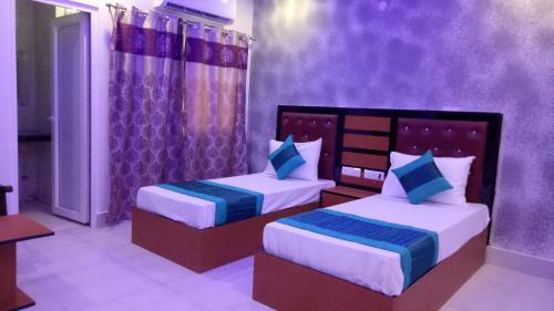 Hotel Capital O 13310 Noida Suites