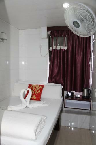 Hostal Pay-less Guesthouse
