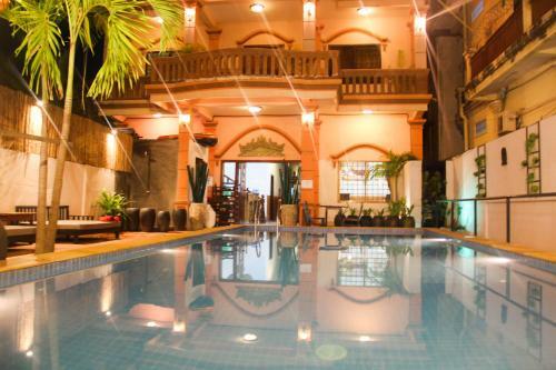 Hostal Tropical Breeze Guesthouse