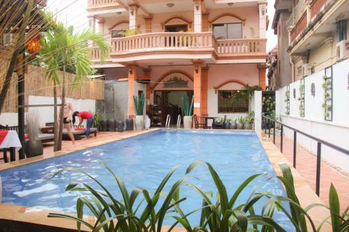 Hostal Tropical Breeze Guesthouse