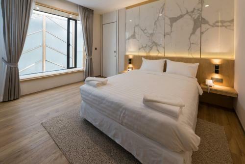 Artino Hotel - Sha Extra Plus