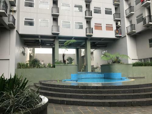 Apartment Grand Asia Afrika Skyen