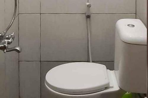 Hotel Maminoti Syariah Residence Redpartner