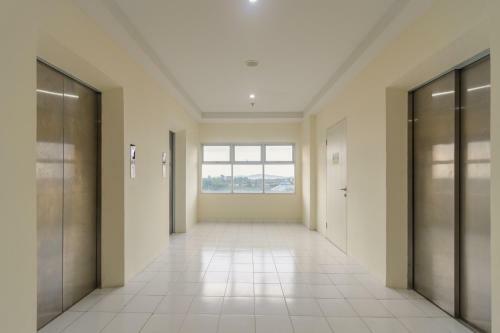 Hostal Reddoorz Apartment @ Dramaga Tower