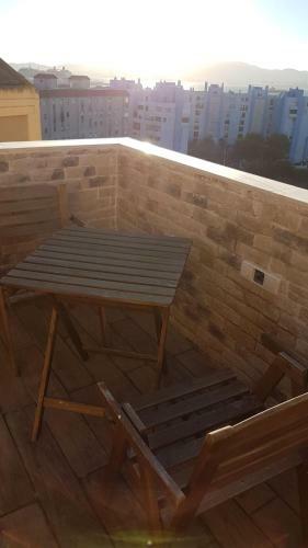 Tiny And Cute Apartment In The Roof Touching Border