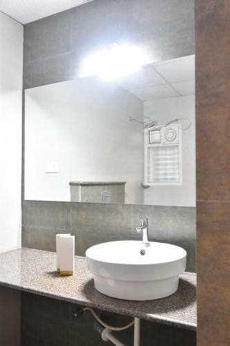 Fabhotel Dhanvitha Suites