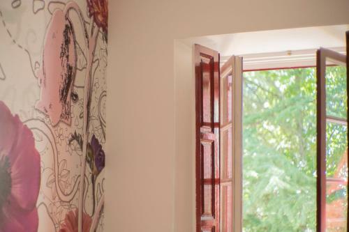 Hostal Casa Jard�n El Colmenar