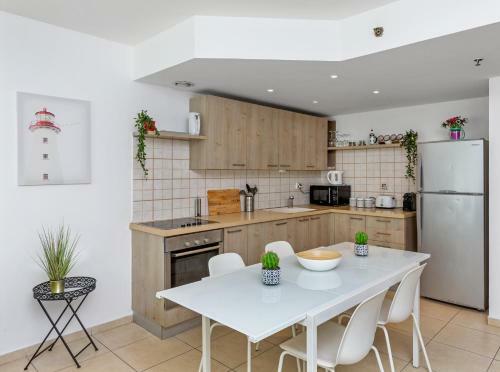Apartamento The Green Garden Suite By The Beach