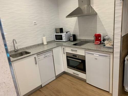 Apartamentos La Arena