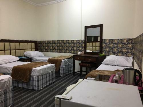 Apartamento Alraqi Plaza Hotel