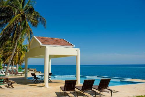 Apartamento Whispering Seas Oceanfront Suite