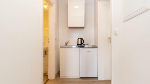 Ginius Homes - Oriental City Apartment