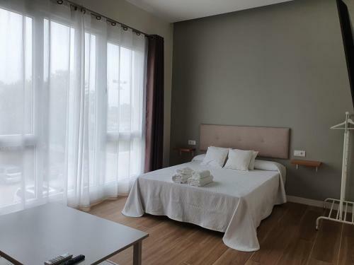 Redondela Apartments - Bedroom, Bathroom & Kitchen