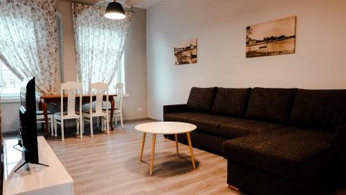 �htu Apartments