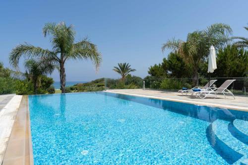 Villa Harmonia - 4 Bedroom Luxury Beach Front Villa With Private Swimming Pool
