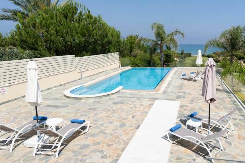 Villa Harmonia - 4 Bedroom Luxury Beach Front Villa With Private Swimming Pool