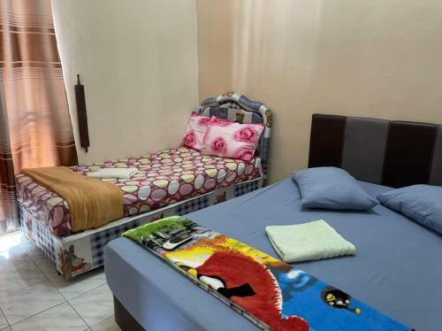 Oyo Home 90424 Embun Homestay