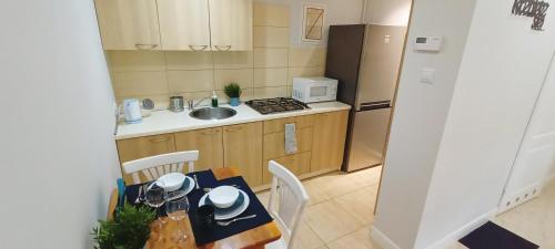Apartament Granatowy ?wi?toduska 12