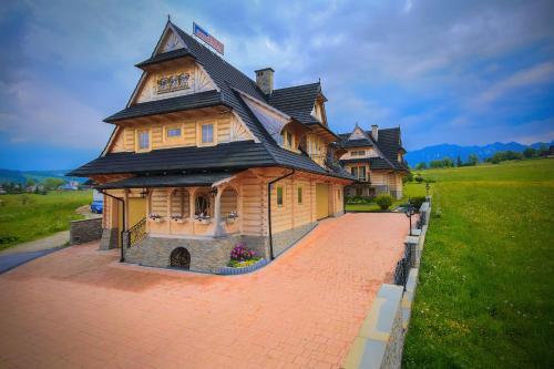 Folk Resort Domki I Apartamenty