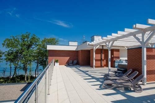 Apartament Przy Pla?y / Klifowa