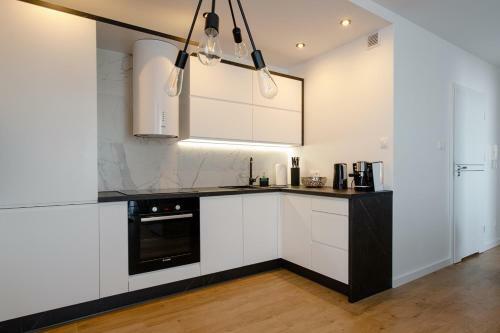 Apartament Przy Pla?y / Klifowa