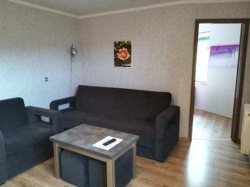 Domino - Pokoje I Apartamenty