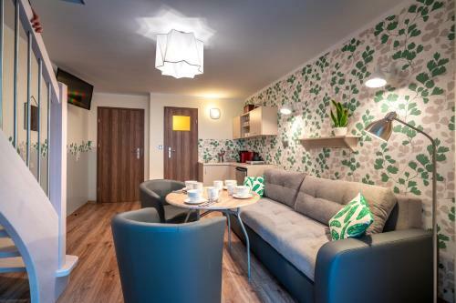 Domino - Pokoje I Apartamenty