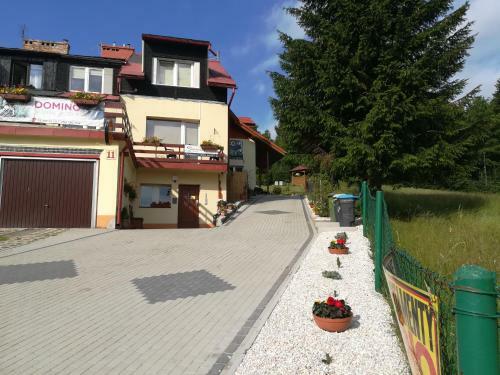Domino - Pokoje I Apartamenty