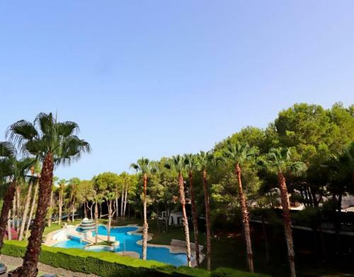 Apartment In Campoamor Overlooking The Swimming Pool