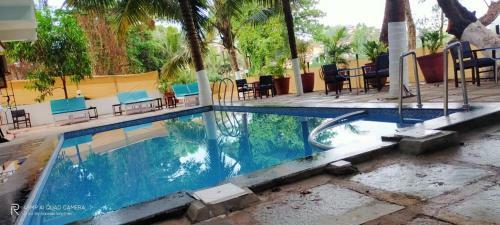 Service Apartments Baga With Pool