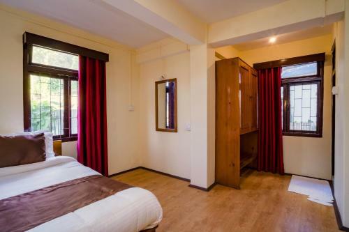 Hotel Magpie Mall Road Residency (Mg Marg)